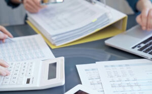 Explore the cost differences between outsourced AR solutions compared to managing AR in-house.